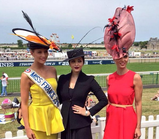 Left: Miss France 2014, Camille Cerf and Aishwarya Rai Bachan in Chantilly France at the Prix de Diane Longines horse racing event
